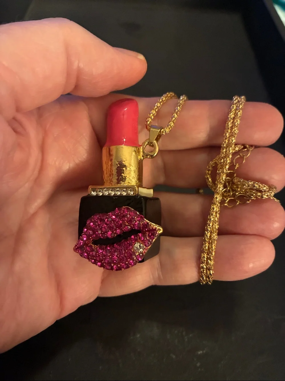 Pink Lipstick Pendant with crystal red lips. White crystal on the bottom lip